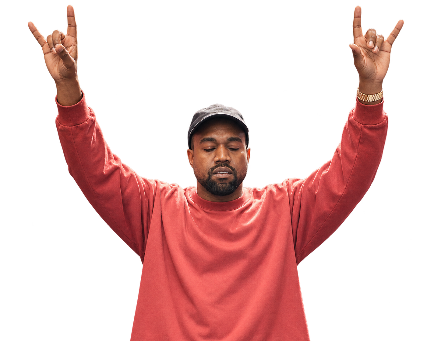 Kanye West with his arms raised